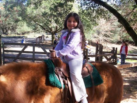 Angela riding horses!