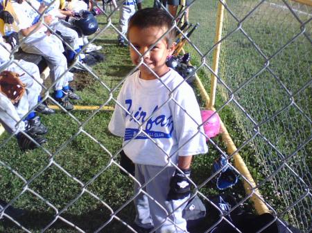 Playing little league Baseball