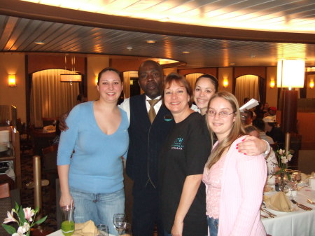 Daughters Christina, Charlotte and Lauren and I with Maxwell on cruise