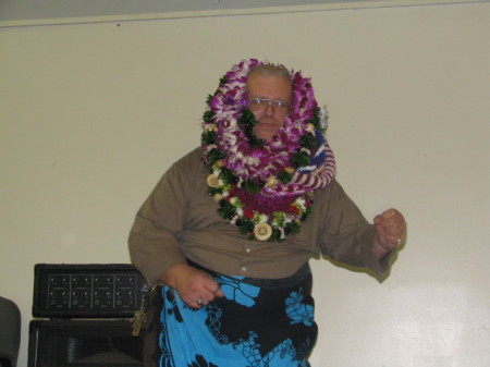 Me dancing in a sarong at my High School 51st birthday party