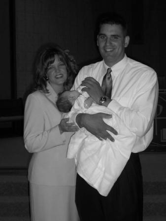 Paige with Mommy&Daddy baptism