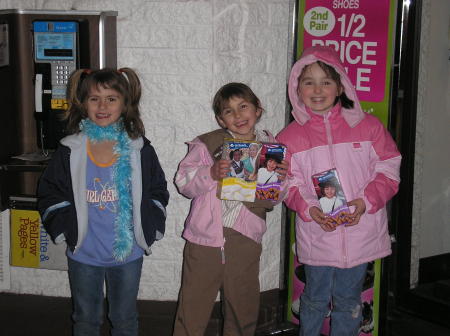 Selling Girl Scout cookies.