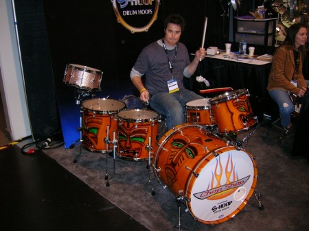 Playing on some drums at NAMM