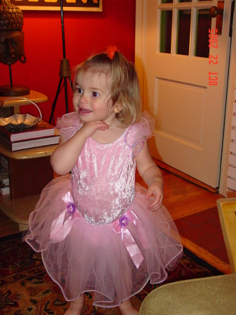 Zoe tries on Daddy's old prom dress.