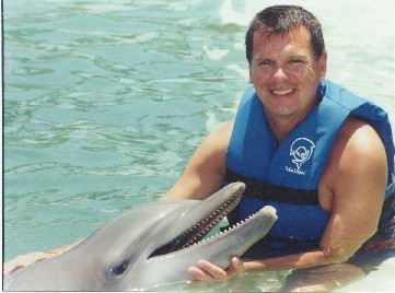 Swimming with the dolphins at Xcaret near Tulum, Mexico - August 2002