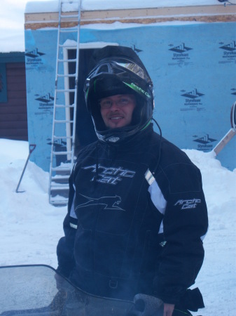 Mike getting ready to go sledding