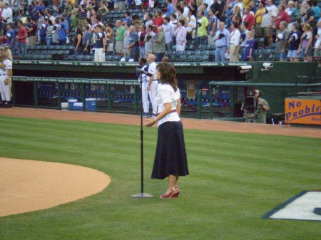 Paula (my sis) singing on the field