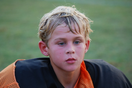 Landon- football practice-age 10