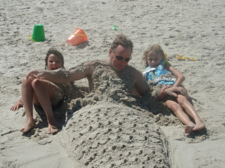 At the beach with our Granddaughters