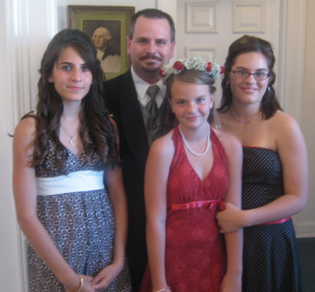 Jerry, Christina, Rebecka and Janie all dressed up for a wedding.