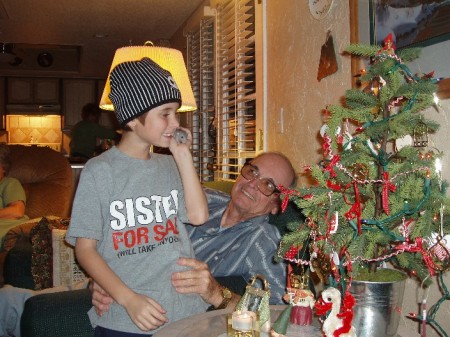 Grandpa, Bryce, and his pet rat Sweetie at Christmas 2005