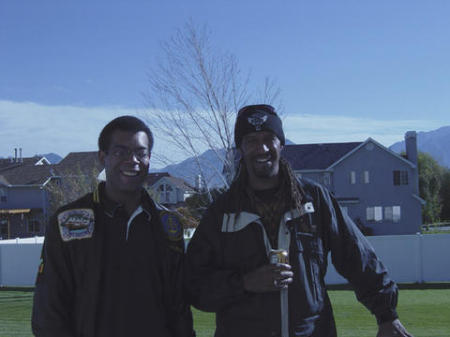 Me and my cuz with the mountains in the background.