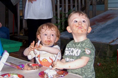 enjoying some cake on 2nd birthday