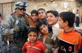 Brandyn with IRAQ children
