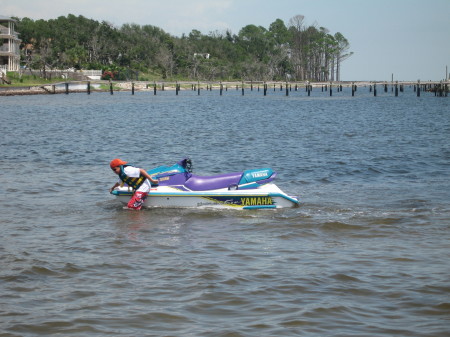 Adam with our waverunner at our house in FL