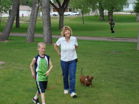 Our precious Zachery with Grandma and dogs