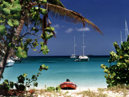 Our dinghy. Our Sailboat in the background