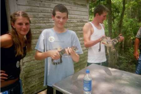 Kids w/ gators in Louisiana bayou