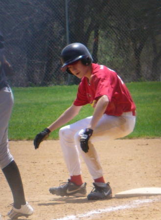 Spencer playing Baseball