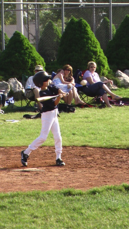 Jakob playing baseball