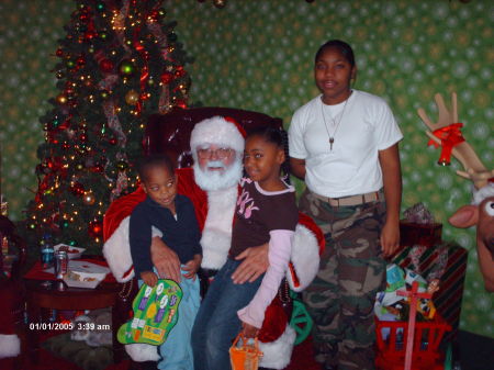 My kids at the EP Board Christmas Party Dec. "06" Jay,Najja,&Nia..  Nia was in the parade with the Young Marines and the Marine Corps Reserves.