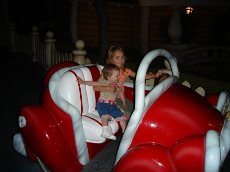 Sophie and Allie cruisin through Disneyland