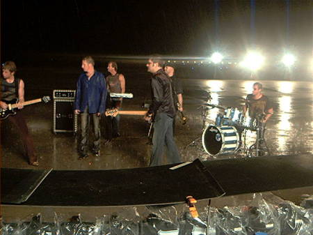 Rascal Flatts film with a rain machine