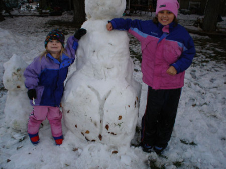 My girls and the back of their anatomically semi-correct snowman.