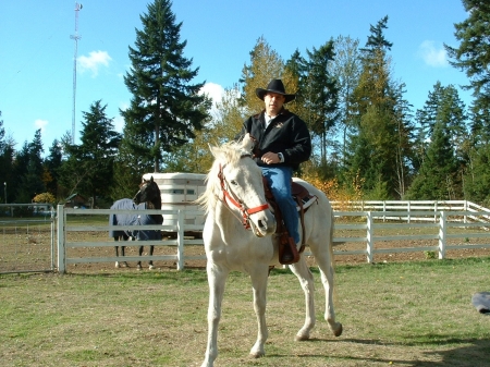 At home giving horses a work out.