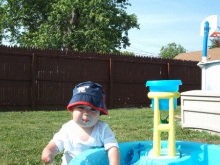 Tyler playing in our backyard!