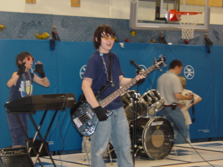 Sid playing bass at 5th grade talent show