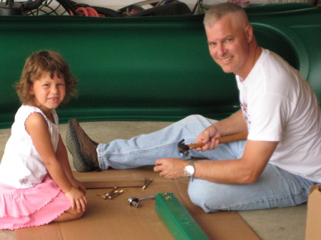 Alex helps daddy build her new playground