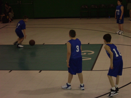 Caleb playing basketball