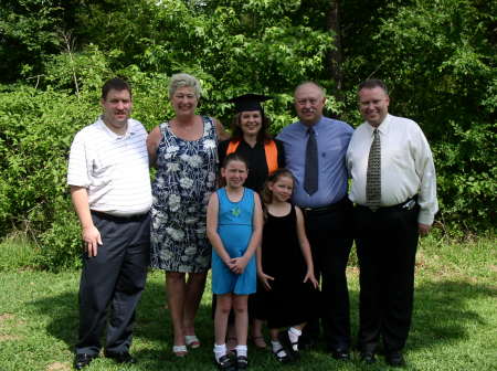 The boys and mom and dad with Sunshine before Graduation