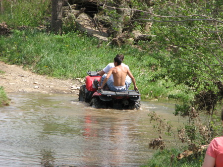 running the creek with the ATV