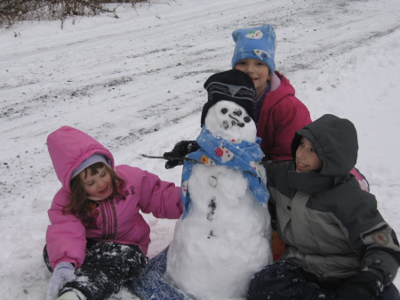 Mykal, Sabine and Caitty with their Snowman 2006