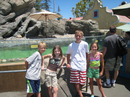 My sister Laurie's son Tyler, my daughter Taylor and my older brother Kirk Powell's kids, Ethan and Annika at Six Flaggs this summer.