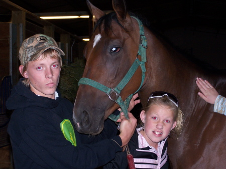 Our kids getting their horse