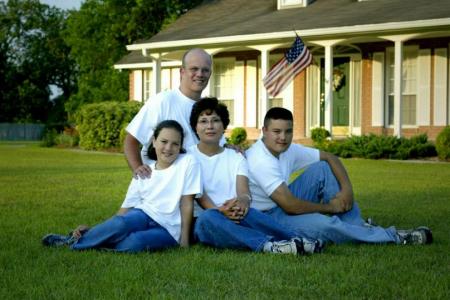 Our family in front of our house