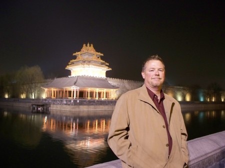 Eddie outside "The Forbidden City" at night