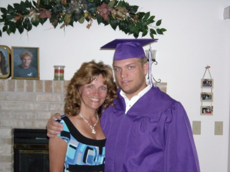 Me and our son David before his grad. ceremony