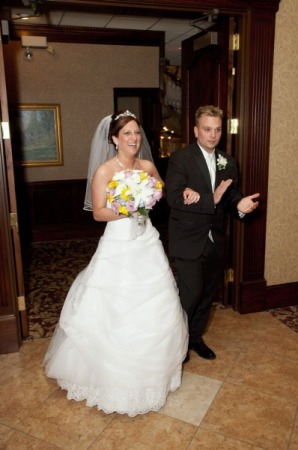 carrie an her new husband entering reception