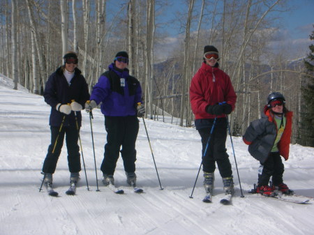 Family skiing in Snowmass, CO