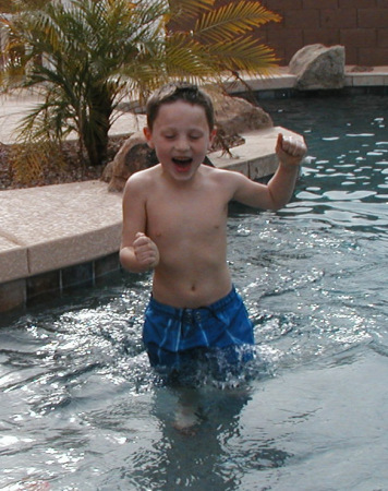 Spencer in the pool at home