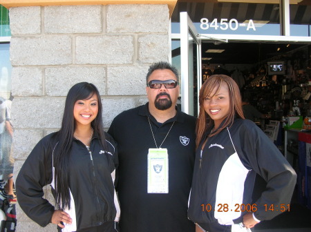 MY HUBBY WITH THE RAIDERETTES!!