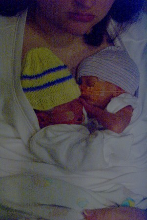 Tristan and Colton with Mommy in the NICU