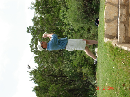 Kenan playing golf