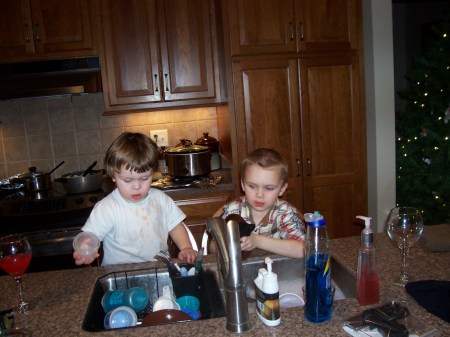 Ethan and Austin doing dishes