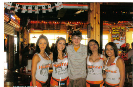 My oldest son James with the hooter girls on his b-day this year