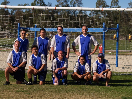 My men's soccer team. I am the guy on the left in the second row with sun glasses on.